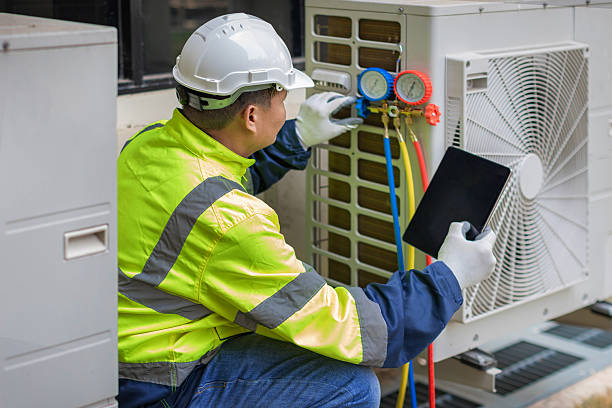 Professional Heat Pump Repair technician working in Tuttle, OK